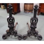 A pair of 19th century cast iron fire dogs (2) Condition Report:Available upon request
