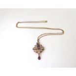 A 9ct gold Edwardian amethyst and pearl pendant brooch on a long 66cm 9ct gold belcher chain, weight