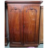 A Victorian mahogany two door wardrobe with fitted interior, 211cm high x 156cm wide x 64cm deep