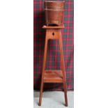 An early 20th century mahogany two tier jardinière stand, 92cm high and a small coopered planter (2)