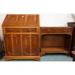 A 20th century fall front writing bureau and a small two drawer open bookcase (2) Condition Report: