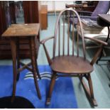A mid 20th century Ercol elm and beech rocking chair and an oak jardinière stand (2) Condition