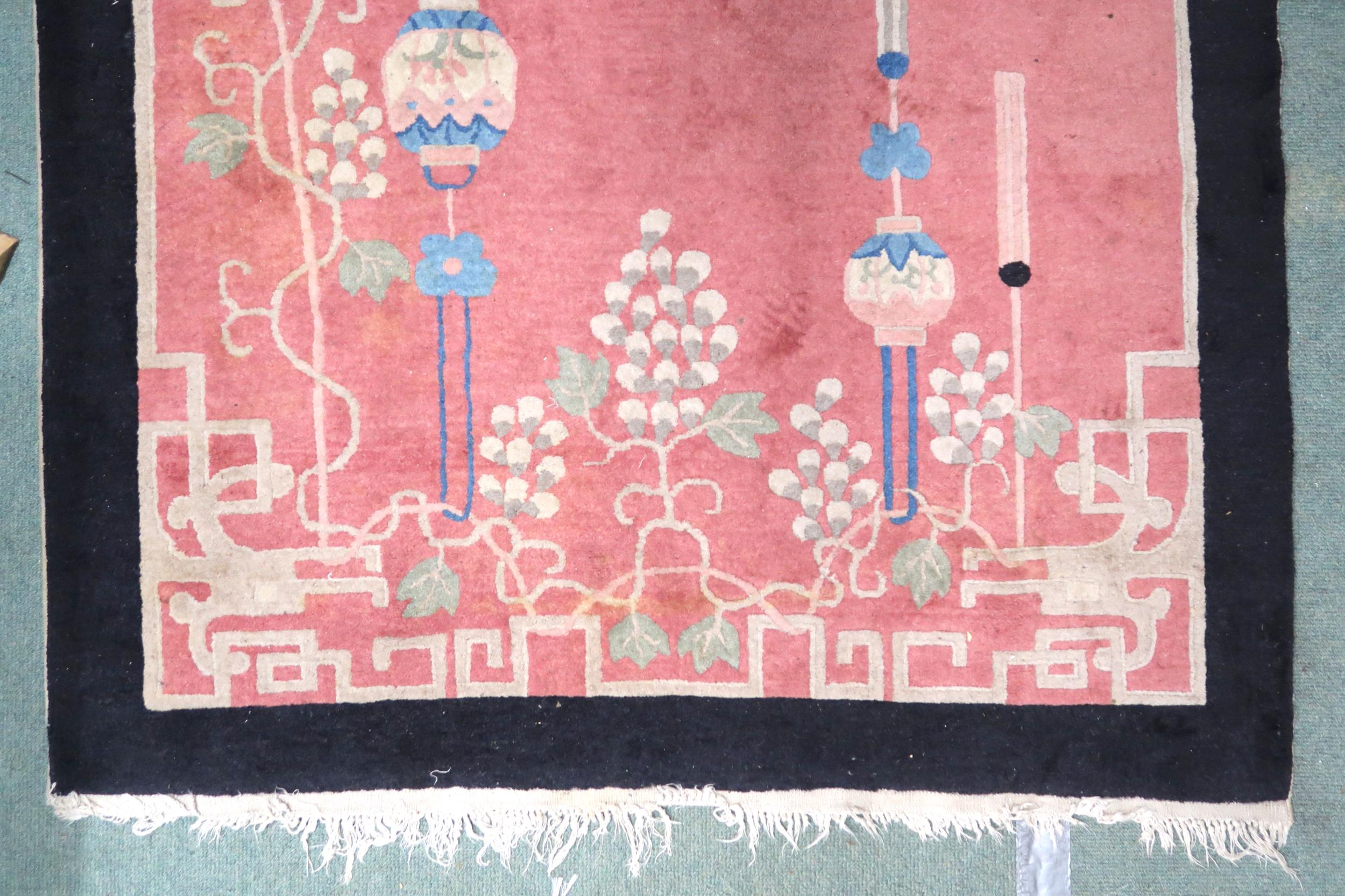 A lot to contain pink ground Oriental style rug with scenic pattern and black border, 213cm long x - Image 5 of 7