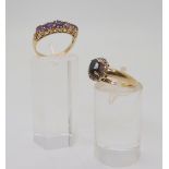 A yellow metal amethyst five stone ring, in scroll mount, size L, together with a 9ct gold