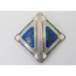 A Liberty & Co silver and enamel buckle, hallmarked Birmingham 1910, with L&Co lozenge stamps. 6.4cm