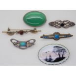 Two Charles Horner enamelled Art Nouveau brooches, both Chester dated 1910 -1912, a Norwegian silver