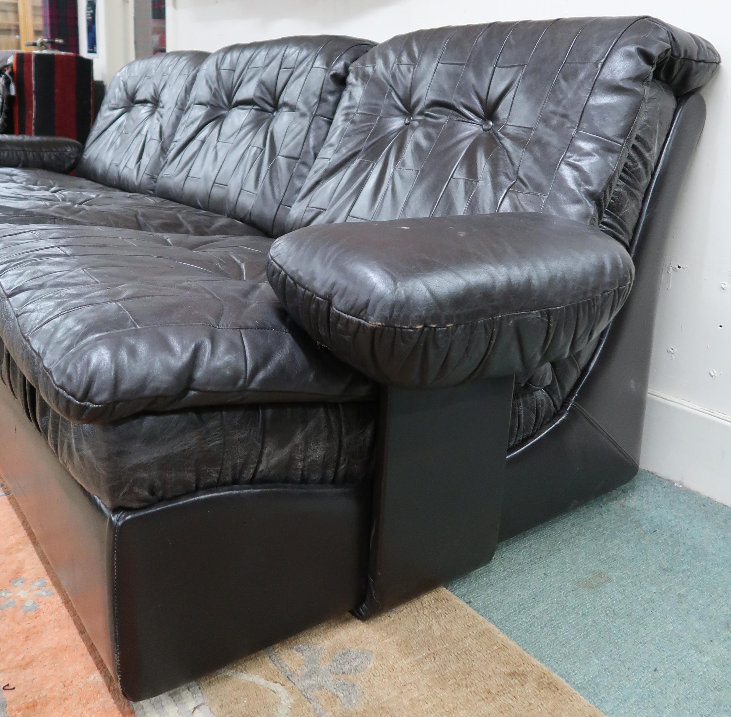 A mid 20th century after Tetrad sectional three seater sofa with black patchwork leather upholstery, - Image 2 of 4