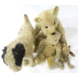 Three threadbare teddy bears of unknown manufacture and varying in size, two of mohair plush and