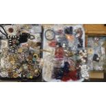 A large collection of vintage costume jewellery to include, pearls, vintage beads, brooches a