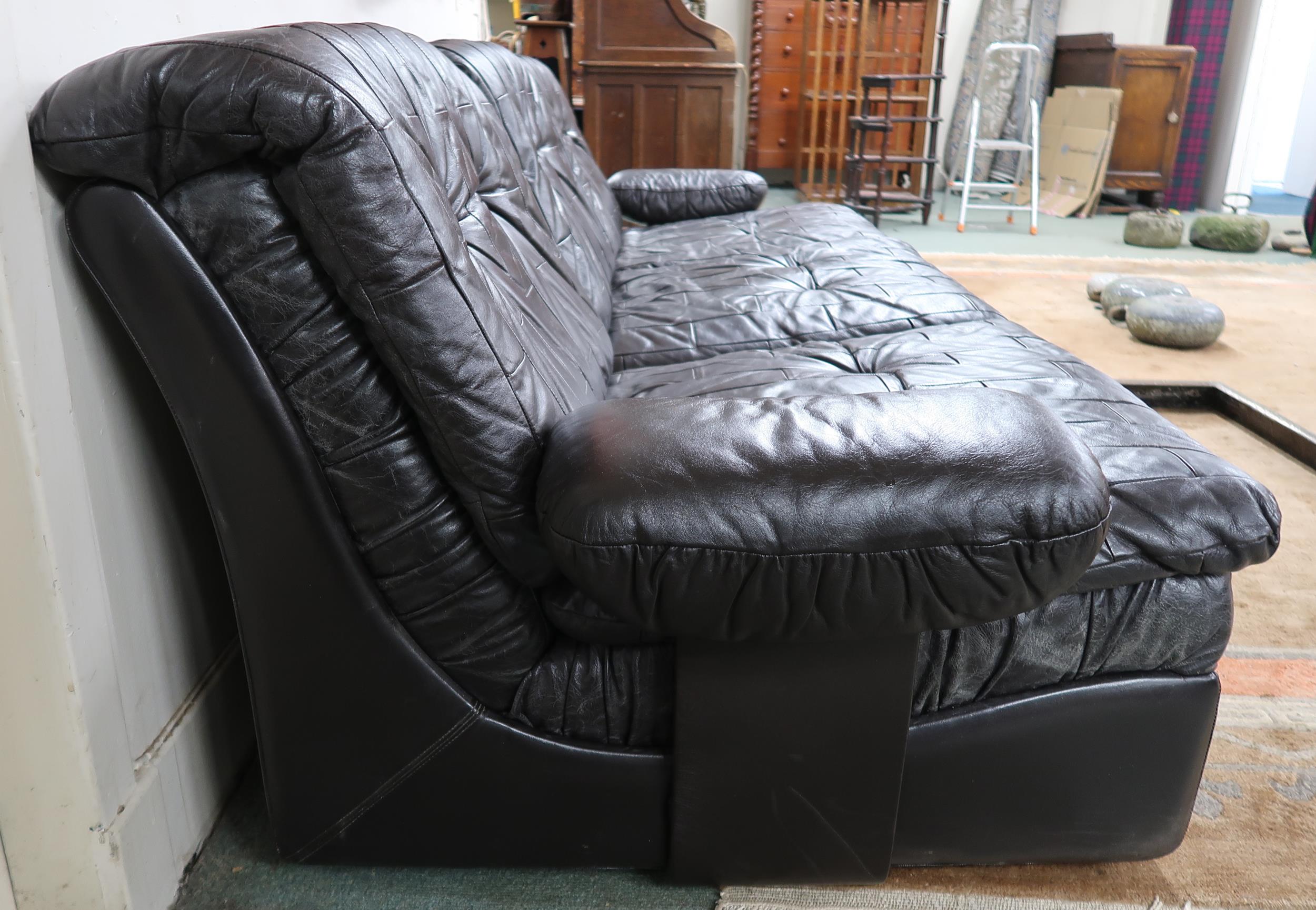 A mid 20th century after Tetrad sectional three seater sofa with black patchwork leather upholstery, - Image 4 of 4