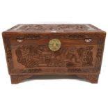 A 20th century carved Oriental hardwood blanket chest with internal sliding tray, 47cm high x 79cm
