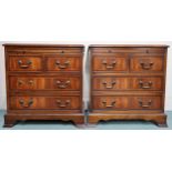 A pair of 20th century mahogany two over three chest of drawers on bracket bases, 61cm high x 59cm