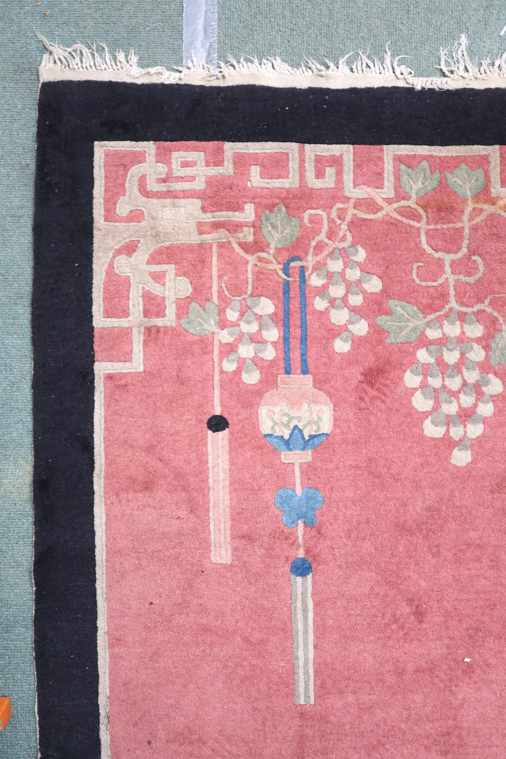 A lot to contain pink ground Oriental style rug with scenic pattern and black border, 213cm long x - Image 4 of 7