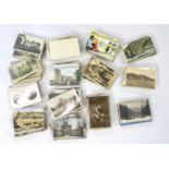 A large quantity of early-20th century tourist postcards, largely British scenes but also