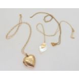 A 9ct gold back & front locket with a 9ct chain, together with two further chains and a mother of