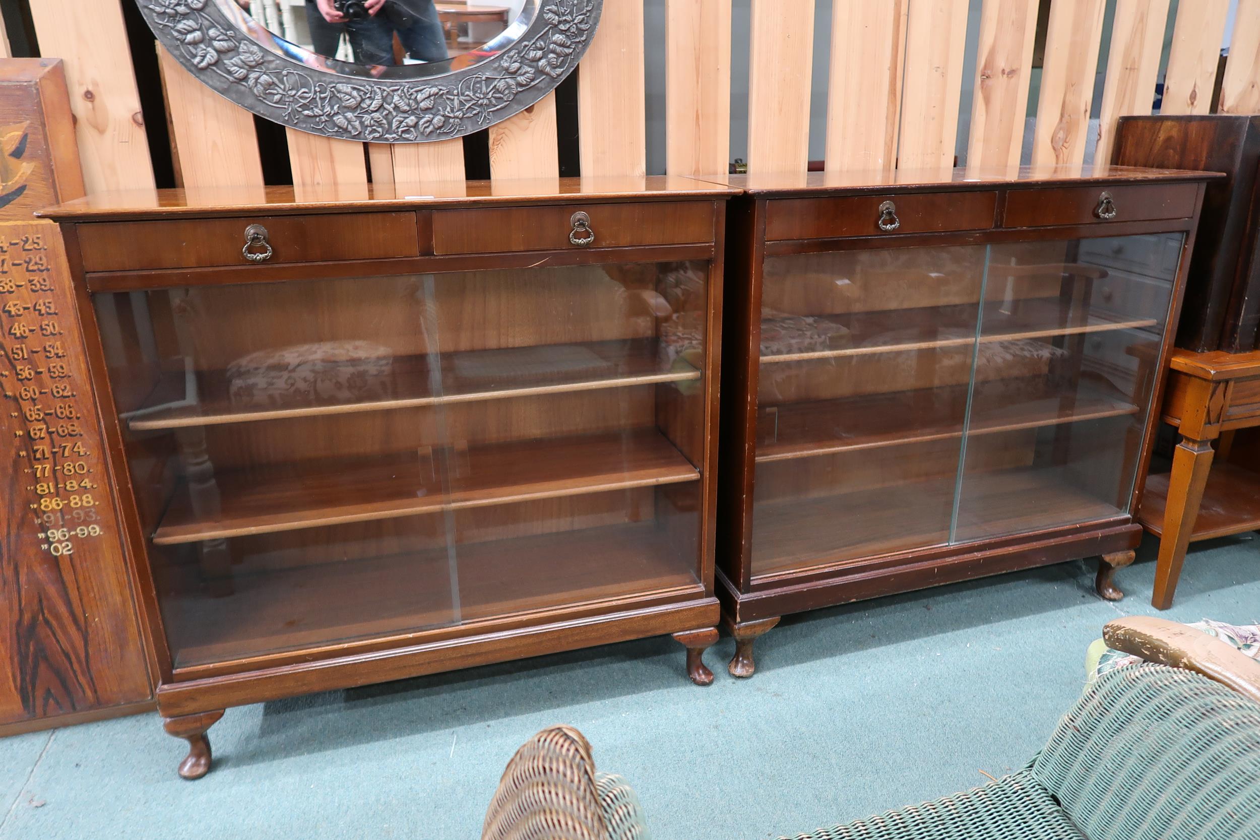 A pair of 20th century stained teak bookcases with pair of drawers over glass sliding doors, 90cm - Image 2 of 6