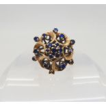 A 10k gold blue gem set retro cluster ring, size Q1/2, weight 7.3gms Condition Report:Available upon