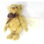 A Steiff Year 2000 Teddy Bear, with white tag, in blond mohair, no. 016382, boxed and with
