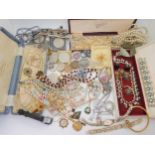 A collection of vintage costume jewellery to include a Damascene pendant, beads and diamante