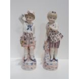 A pair of continental bisque figures of children Condition Report:Available upon request