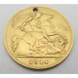 HALF SOVERIEGN COIN GEORGE V 1914 drilled 3.95 grams Condition Report:Available upon request