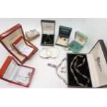 Three items of silver 'Hot Diamond' jewellery, a suite of silver Mackintosh items, silver mounted