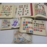 A stamp collection with The Durham Stamp Album with a good collection of world stamps and Great