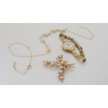 A collection of 9ct gold and yellow metal items to include a pearl set brooch, a Lanco 9ct watch