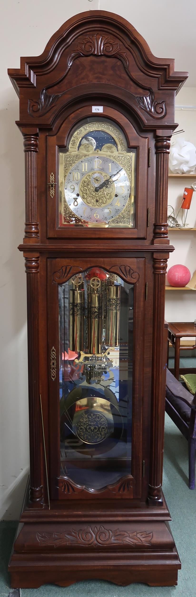 A 20th century mahogany cased  longcase clock with arched brass and silvered dial bearing Arabic