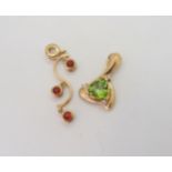 A 9ct gold peridot and diamond pendant, together with a red gem set pendant , weight together 5.4gms