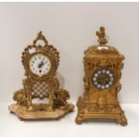 A gilt metal mantle clock with  movement by Gustav Becker, together with another clock on onyx base