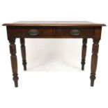 A Victorian mahogany two drawer writing desk with embossed skiver on turned supports, 76cm high x