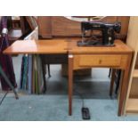 A 20th century Singer 201k sewing machine table and a anglepoise style table lamp (lacking base) (2)