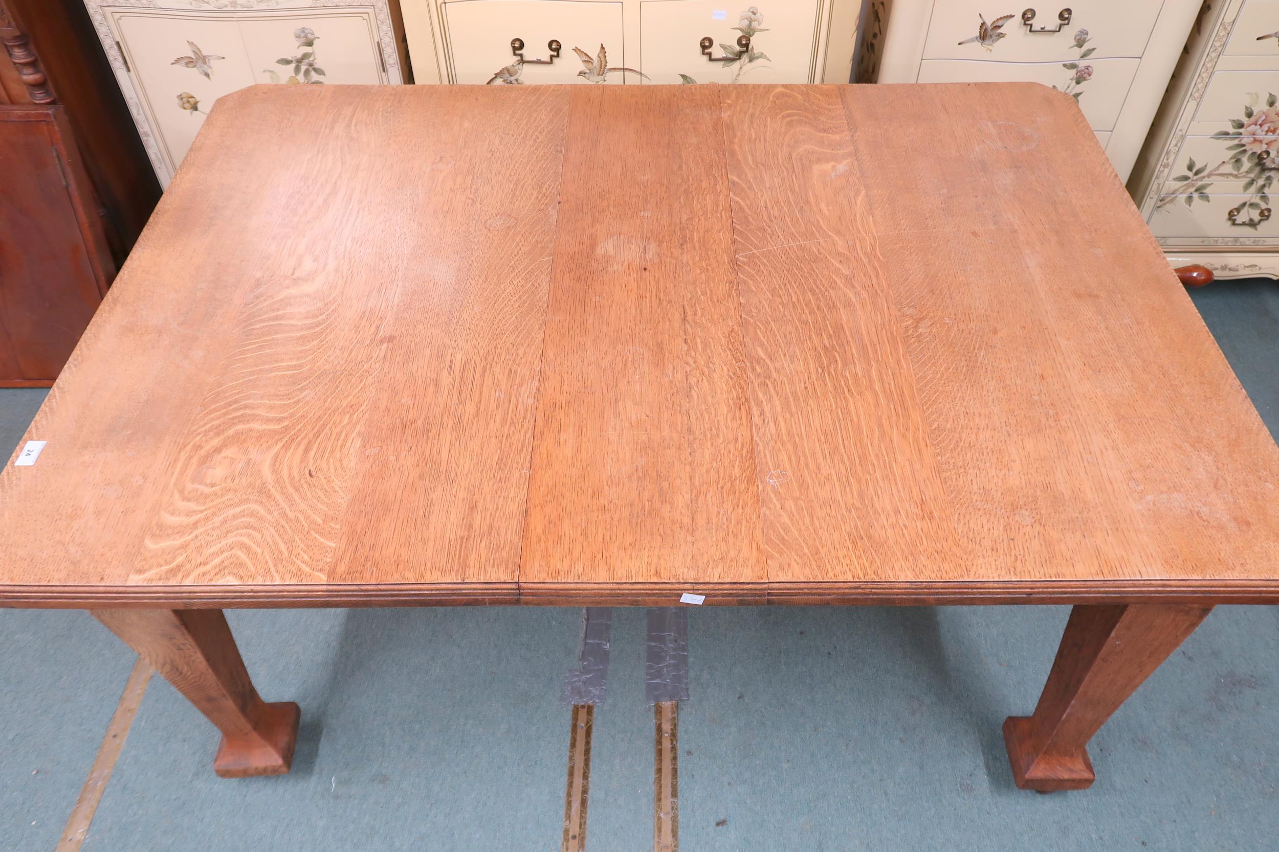 A late Victorian oak arts and crafts style wind out extending dining table with two leaves (one - Image 8 of 9