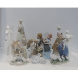 A collection of Lladro and Nao figures of girls and geese, together with two white glazed Doulton