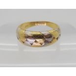 A yellow and white 18ct gold ring, size M1/2, weight 4.6gms Condition Report:Available upon request