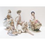 A Lladro figure Love's Tender Tokens together with Boy with Wheelbarrow of Flowers  and three