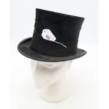 A silk top hat retailed by J. Dawson of Edinburgh, small size (measuring approx. 19cm front-to-