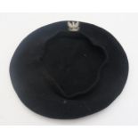 A pre-War Polish Other Ranks black wool beret, with embroidered Polish Eagle patch Condition