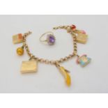 A 14k gold Italian cold enamel charm bracelet, weight 12.5gms, together with an amethyst and clear