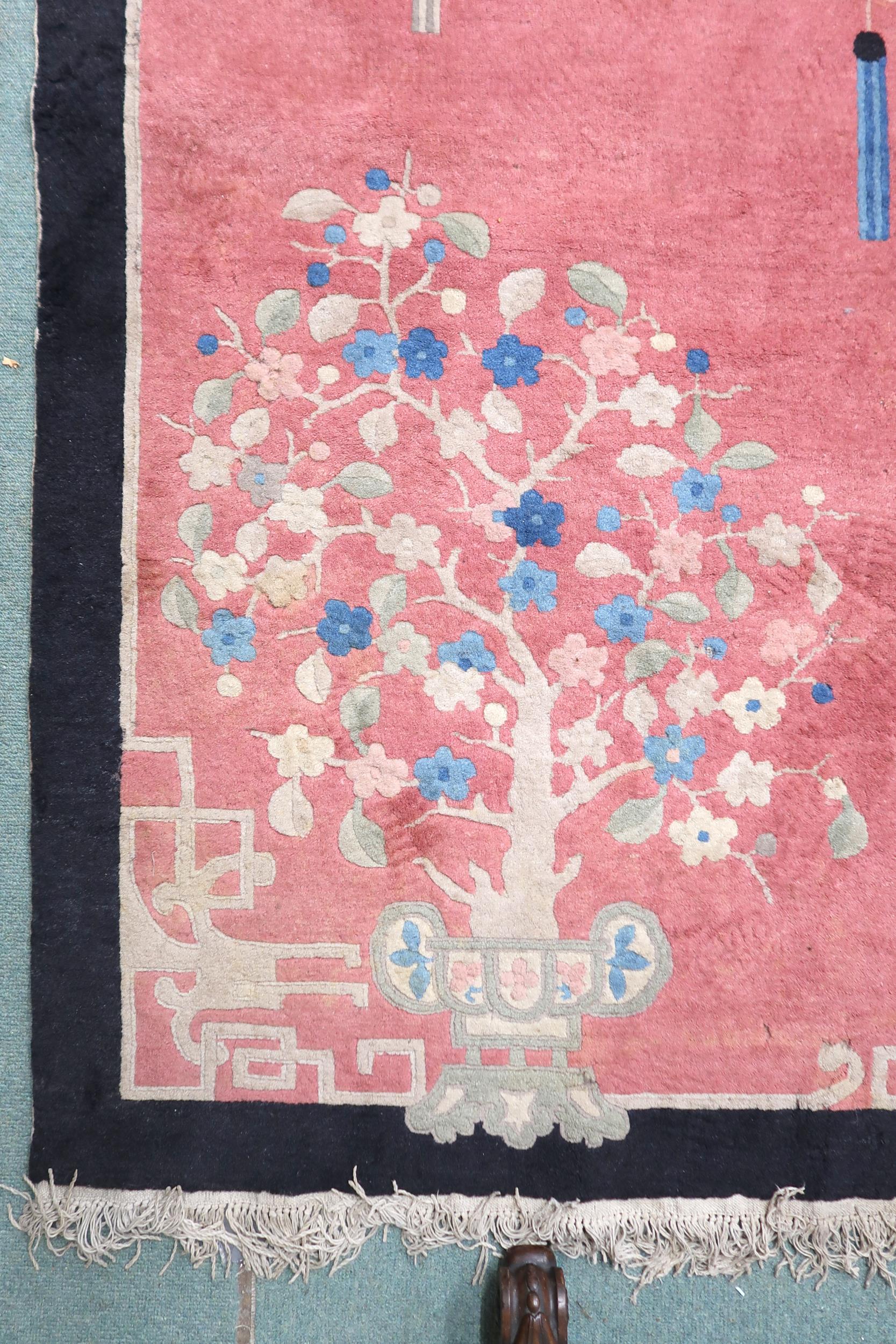 A lot to contain pink ground Oriental style rug with scenic pattern and black border, 213cm long x - Image 3 of 7