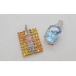 A 9ct white gold fancy cut large blue topaz pendant, length 3cm, and a 9ct diamond accent and