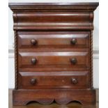 A Victorian mahogany apprentice ogee chest with ogee frieze drawer over three drawer flanked by