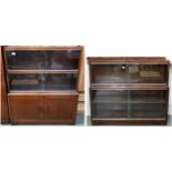 A lot comprising two mid 20th century stained teak Minty bookcases, first is 103cm high x 90cm