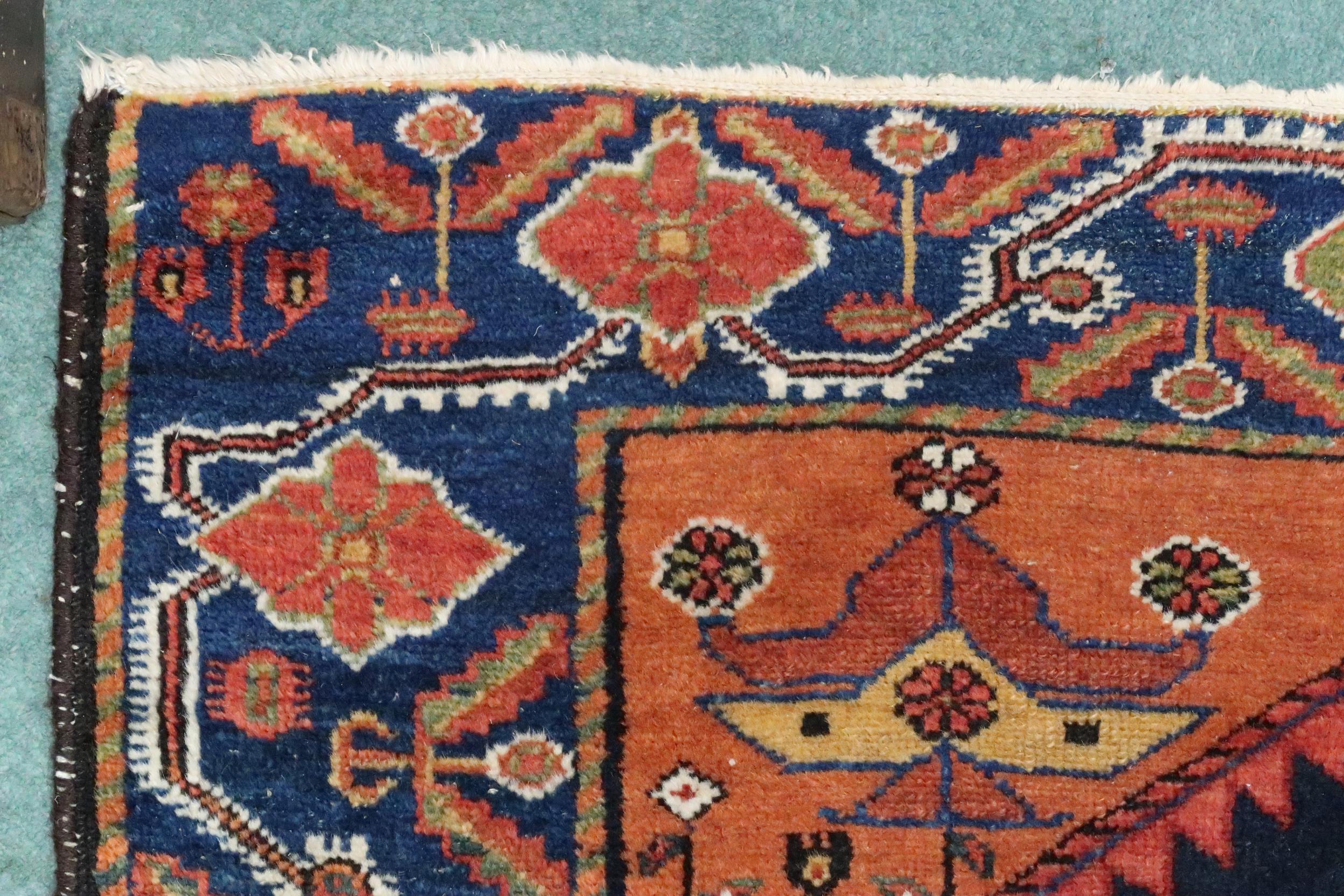 A dark blue ground Hamadan rug with terracotta geometric central medallion, matching spandrels and - Image 6 of 7