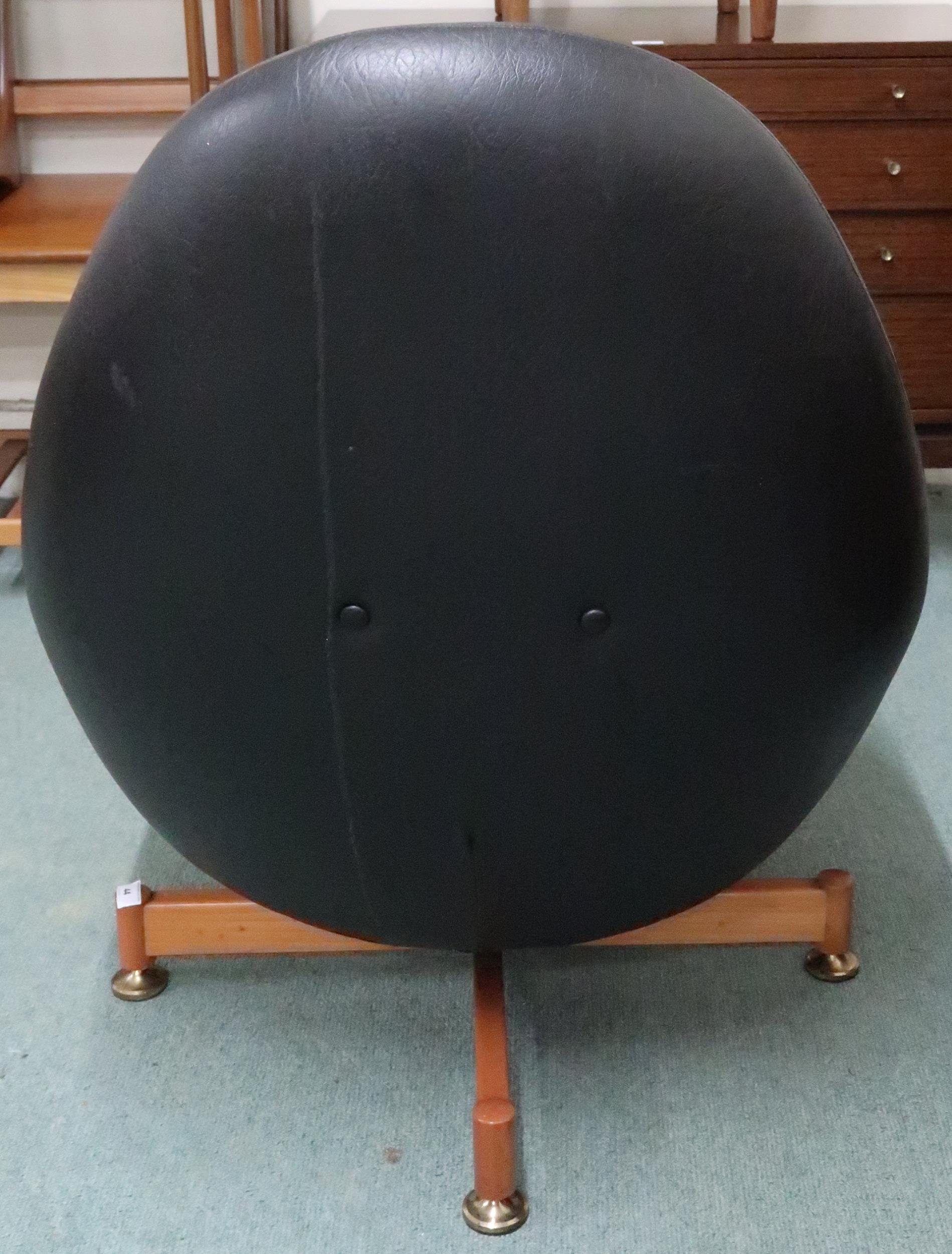 A mid 20th century Greaves and Thomas black vinyl upholstered swivel egg lounge chair on teak - Image 3 of 7