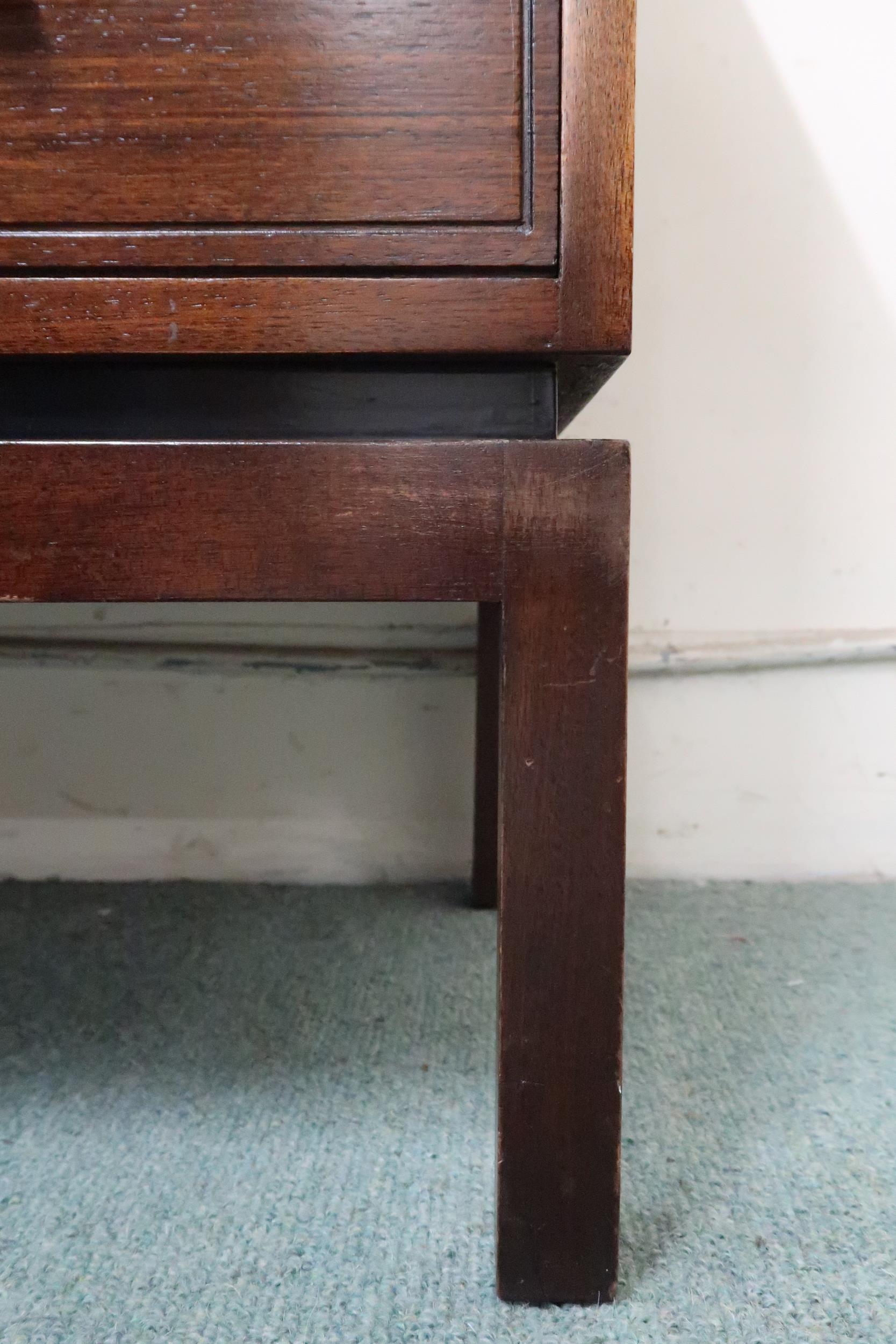 A mid 20th century stained teak Greaves and Thomas graduating chest of four drawers on square - Image 4 of 4