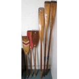 A lot comprising pair of boating oars, four other assorted oars and a canvas dinghy tarp (7)