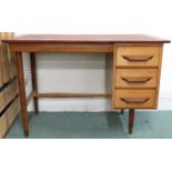 A mid 20th century teak desk with red vinyl skiver over bank of three drawers on tapering