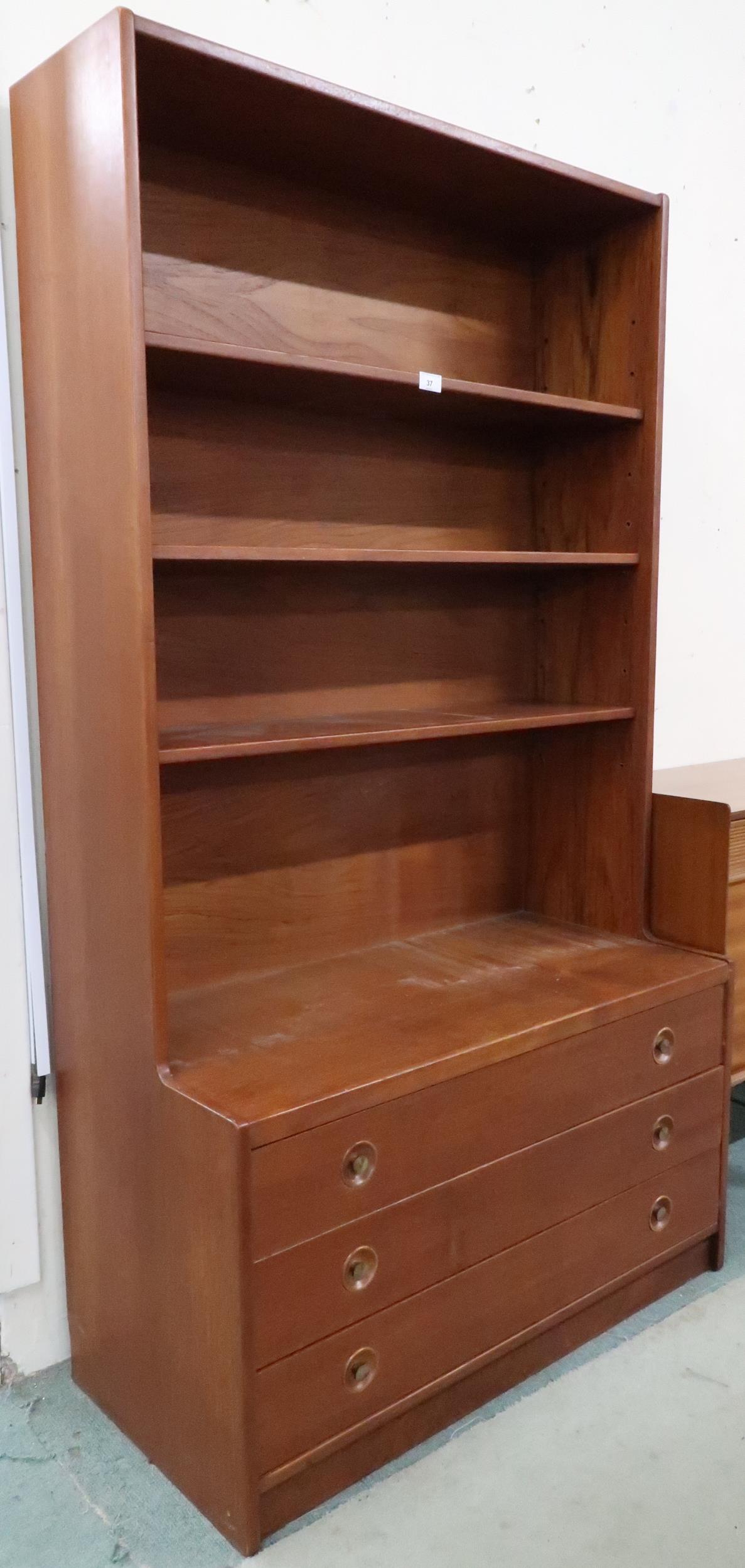 A mid 20th century teak open bookcase with three shelves over three drawers, 166cm high x 92cm